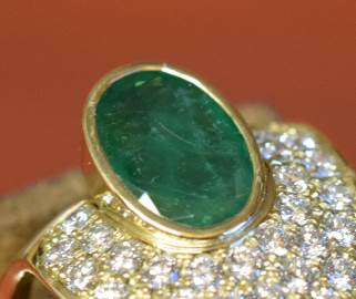 This emerald is set in an oval bezel