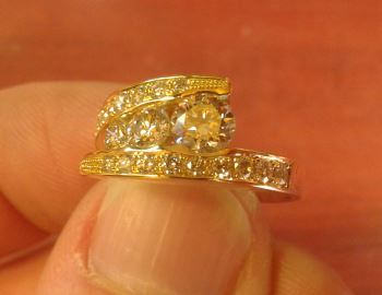 The large diamonds in this ring are channel set